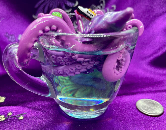 Teacup Kraken, seen from the back to show off the rows of suckers on its tentacles