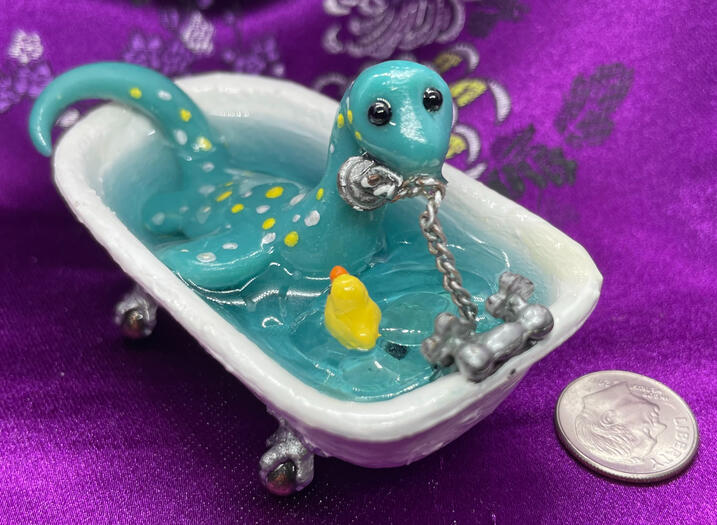 Oops A flustered Nessie pulled the plug in the bath, only to realize their rubber duckie was now caught in the draining whirlpool!
